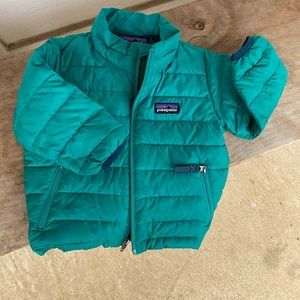 Patagonia coat fits well from 6 months - about 18 months